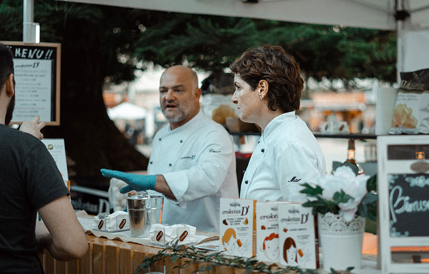 People ordering at a food truck