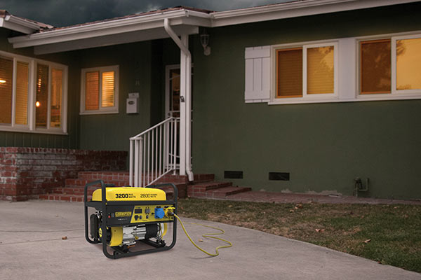 Portable generator outside a house during power outage